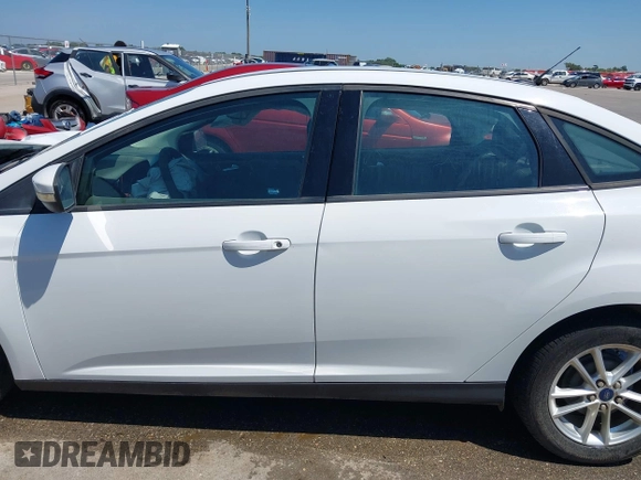 2016 Ford Focus SE z VIN 1FADP3F23GL338496, wystawiony jako IAAI lot #42333608 z przebiegiem 76 972 mil mil oraz . Historia ofert i sprzedaży dostępna na DreamBid. Obrazek 15.