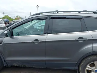 2013 Ford Escape SE with VIN 1FMCU9GX9DUA57901, listed as a IAAI auction lot 42367615 with 140,000 mi miles and . Bid and sale history available at DreamBid. Image 14.