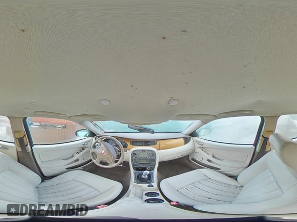 2004 Jaguar X-Type z VIN SAJEB52D54XD68737, wystawiony jako Copart lot #85168784 z przebiegiem 150 975 mil mil oraz Szkoda całkowita • Salvage title. Historia ofert i sprzedaży dostępna na DreamBid. Obrazek 12.