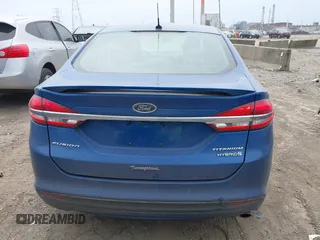 2017 Ford Fusion Hybrid Titanium с VIN 3FA6P0RU5HR388615, выставлен на аукционе IAAI как лот 42066142 с пробегом 121 618 миль миль и . История ставок и продаж доступна на DreamBid. Изображение 16.