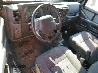 2001 Jeep Wrangler Sport with VIN 1J4FA49S41P352844, listed as a Copart auction lot 69216924 with 160,129 mi miles and Clean Title. Bid and sale history available at carsss.com. Image 8.
