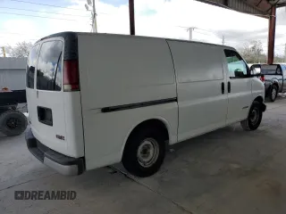1998 GMC Savana z VIN 1GTEG15M7W1029632, wystawiony jako Copart lot #56106675 z przebiegiem Nie podano mil oraz Nie do naprawy. Historia ofert i sprzedaży dostępna na DreamBid. Obrazek 3.