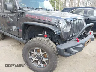 2018 Jeep Wrangler Unlimited Rubicon with VIN 1C4HJXFG8JW111195, listed as a IAAI auction lot 41916718 with 190,158 mi miles and . Bid and sale history available at DreamBid. Image 6.