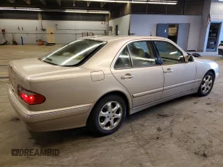 2002 Mercedes-Benz E-Class with VIN WDBJF65J12B485293, listed as a Copart auction lot 77561984 with 140,708 mi miles and Salvage Title. Bid and sale history available at carsss.com. Image 3.