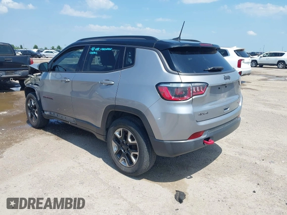 2018 Jeep Compass Trailhawk with VIN 3C4NJDDB2JT198784, listed as a IAAI auction lot 42405539 with 121,553 mi miles and . Bid and sale history available at DreamBid. Image 3.