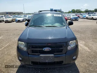 2012 Ford Escape XLT с VIN 1FMCU9DGXCKB00382, выставлен на аукционе Copart как лот 62290155 с пробегом 195 177 миль миль и Списание • Salvage title. История ставок и продаж доступна на DreamBid. Изображение 5.