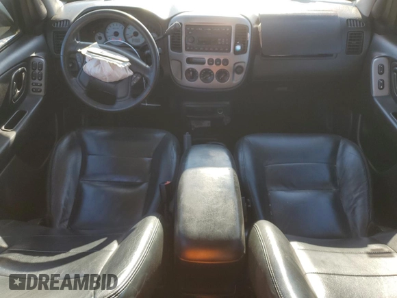 2004 Ford Escape Limited with VIN 1FMCU041X4KA45604, listed as a Copart auction lot 80974334 with 88,687 mi miles and Salvage title. Bid and sale history available at DreamBid. Image 8.