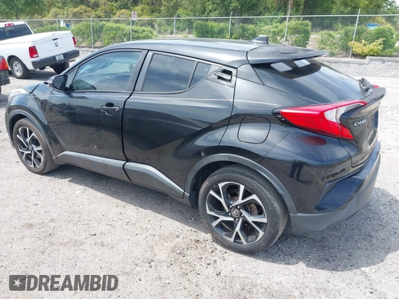 2018 Toyota C-HR XLE with VIN NMTKHMBX0JR008423, listed as a IAAI auction lot 42091445 with 124,811 mi miles. Bid and sale history available at carsss.com. Image 3.