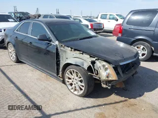 2011 Cadillac CTS Premium with VIN 1G6DS5ED9B0151820, listed as a IAAI auction lot 41909346 with 142,007 mi miles. Bid and sale history available at carsss.com. Image 1.