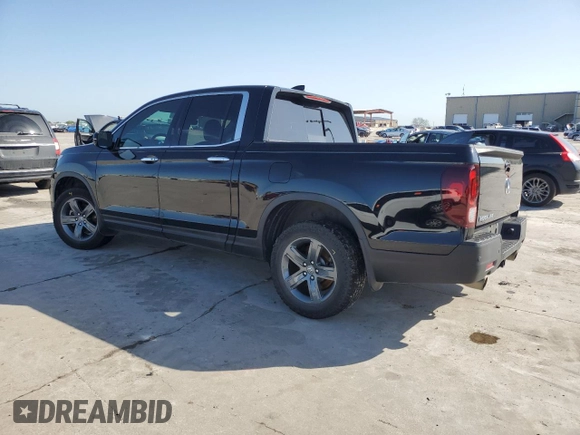 2023 Honda Ridgeline RTL-E with VIN 5FPYK3F72PB001592, listed as a Copart auction lot 52154625 with 41,153 mi miles and Salvage title. Bid and sale history available at DreamBid. Image 2.