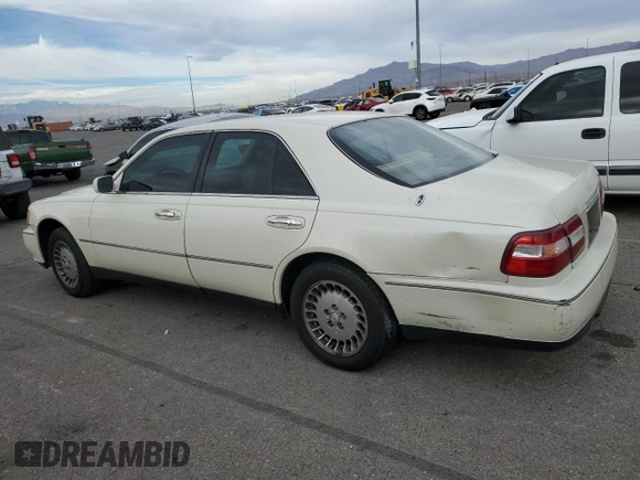 1998 Infiniti Q45 z VIN JNKBY31A8WM403038, wystawiony jako Copart lot #86904484 z przebiegiem 136 142 mil mil oraz Szkoda całkowita • Salvage title. Historia ofert i sprzedaży dostępna na DreamBid. Obrazek 2.