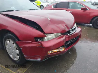 1996 Honda Accord LX with VIN 1HGCD5639TA011773, listed as a IAAI auction lot 41583086 with 148,439 mi miles and . Bid and sale history available at carsss.com. Image 6.