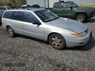 2002 Saturn LW z VIN 1G8JW84RX2Y574971, wystawiony jako Copart lot #52973795 z przebiegiem 155 227 mil mil oraz Tytuł czysty. Historia ofert i sprzedaży dostępna na DreamBid. Obrazek 4.
