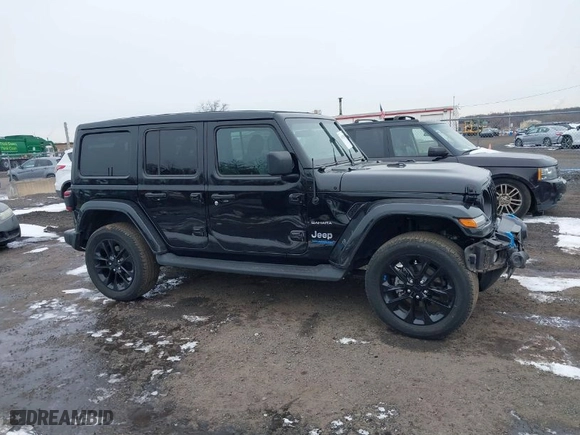 2022 Jeep Wrangler 4xe Unlimited Sahara with VIN 1C4JJXP66NW101035, listed as a IAAI auction lot 41528135 with 17,943 mi miles. Bid and sale history available at carsss.com. Image 13.