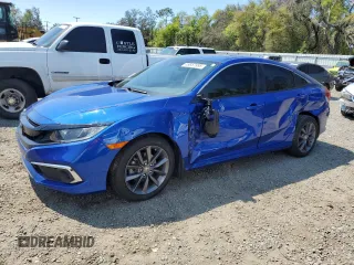 2021 Honda Civic Sedan EX with VIN 19XFC1F33ME010382, listed as a Copart auction lot 48657995 with 33,102 mi miles and Salvage Title. Bid and sale history available at carsss.com. Image 1.