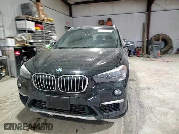 2018 BMW X1 xDrive28i with VIN WBXHT3C37J5L30341, listed as a Copart auction lot 42691505 with 84,523 mi miles and Salvage Title. Bid and sale history available at carsss.com. Image 11.