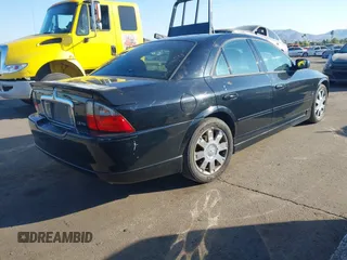 2003 Lincoln LS Sport z VIN 1LNHM87A33Y689084, wystawiony jako IAAI lot #41023405 z przebiegiem 205 200 mil mil oraz . Historia ofert i sprzedaży dostępna na DreamBid. Obrazek 4.
