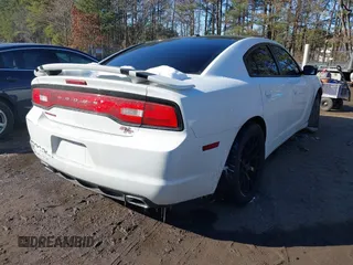 2013 Dodge Charger RT with VIN 2C3CDXCT7DH583673, listed as a IAAI auction lot 41370924 with 133,474 mi miles. Bid and sale history available at carsss.com. Image 4.