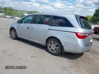 2012 Honda Odyssey EX-L with VIN 5FNRL5H67CB139701, listed as a IAAI auction lot 42233283 with 147,143 mi miles and . Bid and sale history available at DreamBid. Image 3.