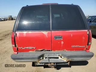 1996 GMC Yukon with VIN 1GKEK13RXTJ743218, listed as a Copart auction lot 70217184 with 256,504 mi miles and Clean Title. Bid and sale history available at carsss.com. Image 6.