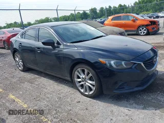 2014 Mazda 6 i Touring with VIN JM1GJ1V66E1127545, listed as a IAAI auction lot 42363891 with 204,697 mi miles and . Bid and sale history available at DreamBid. Image 1.