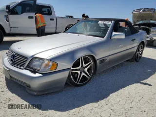 1995 Mercedes-Benz SL with VIN WDBFA76E9SF119909, listed as a Copart auction lot 77421774 with Not provided miles and Salvage title. Bid and sale history available at DreamBid. Image 1.