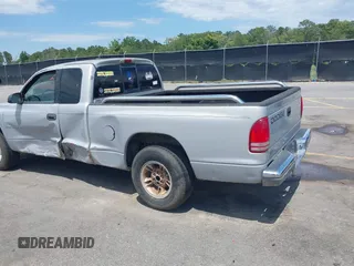 1999 Dodge Dakota SLT z VIN 1B7GL22X9XS258964, wystawiony jako IAAI lot #42309862 z przebiegiem 177 561 mil mil oraz . Historia ofert i sprzedaży dostępna na DreamBid. Obrazek 3.