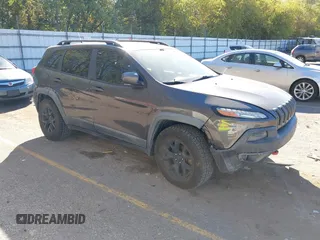 2014 Jeep Cherokee Trailhawk with VIN 1C4PJMBB0EW237741, listed as a IAAI auction lot 40505251 with 139,883 mi miles. Bid and sale history available at carsss.com. Image 1.