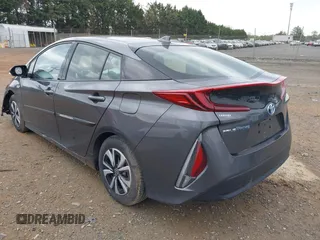 2018 Toyota Prius Plus with VIN JTDKARFP6J3078362, listed as a IAAI auction lot 42021835 with 61,170 mi miles and . Bid and sale history available at DreamBid. Image 3.