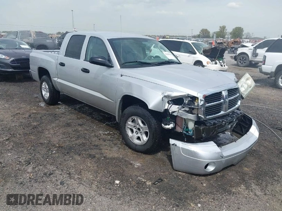 2007 Dodge Dakota SLT with VIN 1D7HE48KX7S122712, listed as a IAAI auction lot 41888864 with 114,384 mi miles and . Bid and sale history available at carsss.com. Image 1.
