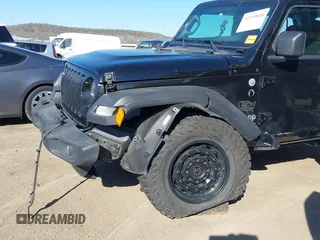 2021 Jeep Wrangler Sport with VIN 1C4GJXAG8MW559296, listed as a IAAI auction lot 41759848 with 47,374 mi miles and . Bid and sale history available at DreamBid. Image 6.