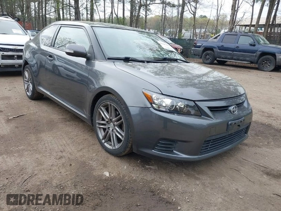 2012 Scion tC with VIN JTKJF5C7XC3031406, listed as a IAAI auction lot 41947478 with 150,762 mi miles. Bid and sale history available at carsss.com. Image 1.