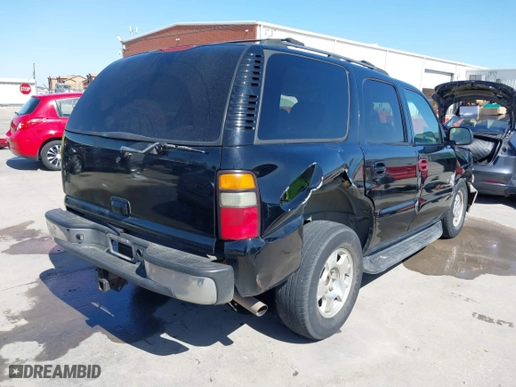 2002 Chevrolet Tahoe LT with VIN 1GNEC13Z32R299695, listed as a IAAI auction lot 41721527 with 230,544 mi miles. Bid and sale history available at carsss.com. Image 4.