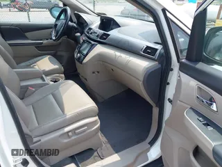 2014 Honda Odyssey EX-L with VIN 5FNRL5H62EB109573, listed as a IAAI auction lot 42387637 with 208,061 mi miles and . Bid and sale history available at DreamBid. Image 5.
