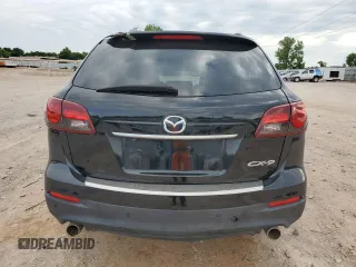 2015 Mazda CX-9 Grand Touring z VIN JM3TB2DA3F0452322, wystawiony jako Copart lot #57821285 z przebiegiem 147 610 mil mil oraz Czysty tytuł • Clean title. Historia ofert i sprzedaży dostępna na DreamBid. Obrazek 6.