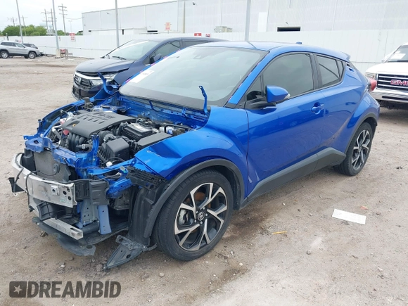 2020 Toyota C-HR LE with VIN JTNKHMBX7L1077218, listed as a IAAI auction lot 41994809 with 69,441 mi miles and . Bid and sale history available at DreamBid. Image 2.