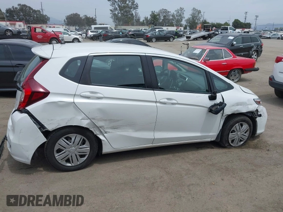2020 Honda Fit LX with VIN 3HGGK5H44LM718313, listed as a IAAI auction lot 42358302 with 63,964 mi miles and . Bid and sale history available at DreamBid. Image 13.