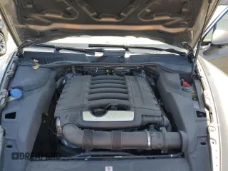 2014 Porsche Cayenne z VIN WP1AA2A28ELA91097, wystawiony jako Copart lot #57812585 z przebiegiem 115 596 mil mil oraz Szkoda całkowita • Salvage title. Historia ofert i sprzedaży dostępna na DreamBid. Obrazek 12.