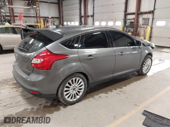 2012 Ford Focus Titanium with VIN 1FAHP3N27CL313288, listed as a IAAI auction lot 41741895 with 140,376 mi miles and . Bid and sale history available at carsss.com. Image 4.