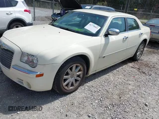 2010 Chrysler 300 C Hemi with VIN 2C3CA6CT6AH114461, listed as a IAAI auction lot 41779993 with 126,898 mi miles and . Bid and sale history available at carsss.com. Image 2.