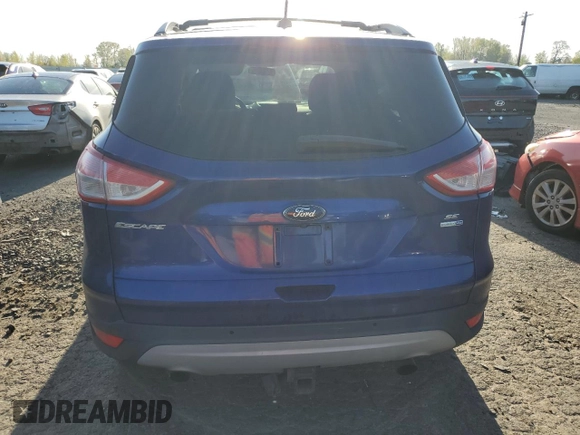 2014 Ford Escape SE z VIN 1FMCU9G95EUB88150, wystawiony jako Copart lot #52570095 z przebiegiem 143 129 mil mil oraz Szkoda całkowita • Salvage title. Historia ofert i sprzedaży dostępna na DreamBid. Obrazek 6.