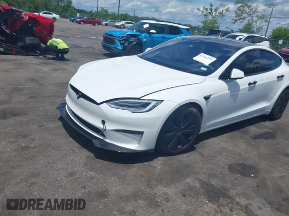 2021 Tesla Model S Plaid с VIN 5YJSA1E62MF438406, выставлен на аукционе IAAI как лот 42246901 с пробегом Не указан миль и . История ставок и продаж доступна на DreamBid. Изображение 17.