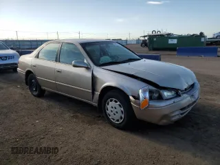 1999 Toyota Camry LE с VIN 4T1BG22K7XU516756, выставлен на аукционе Copart как лот 54065105 с пробегом 176 051 миль миль и Списание • Salvage title. История ставок и продаж доступна на DreamBid. Изображение 4.