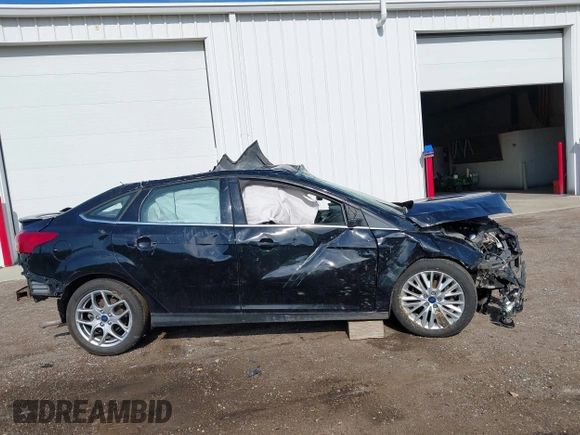 2016 Ford Focus Titanium with VIN 1FADP3J22GL242818, listed as a IAAI auction lot 42177015 with Not provided miles and . Bid and sale history available at DreamBid. Image 13.