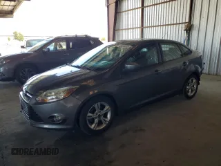 2012 Ford Focus SE with VIN 1FAHP3F28CL114572, listed as a Copart auction lot 63053035 with 142,994 mi miles and Salvage title. Bid and sale history available at DreamBid. Image 1.
