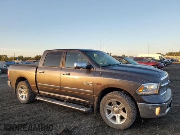 2014 Ram 1500 Longhorn with VIN 1C6RR7PMXES370857, listed as a Copart auction lot 69699954 with 105,590 mi miles and Salvage title. Bid and sale history available at DreamBid. Image 4.
