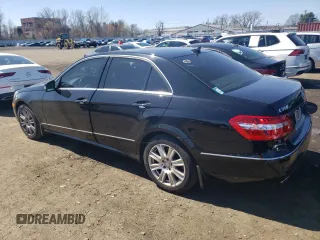 2013 Mercedes-Benz E 350 Luxury with VIN WDDHF8JB6DA661022, listed as a Copart auction lot 52030585 with 165,279 mi miles and Salvage Title. Bid and sale history available at DreamBid. Image 2.