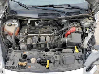 2016 Ford Fiesta SE z VIN 3FADP4BJXGM149197, wystawiony jako Copart lot #57100405 z przebiegiem 106 429 mil mil oraz Nie do naprawy • Non repairable. Historia ofert i sprzedaży dostępna na DreamBid. Obrazek 11.