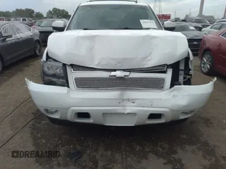 2010 Chevrolet Tahoe LS with VIN 1GNUKAE09AR265739, listed as a IAAI auction lot 36547416 with 153,964 mi miles and . Bid and sale history available at DreamBid. Image 6.