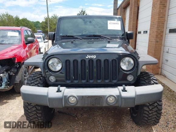 2015 Jeep Wrangler Unlimited Rubicon with VIN 1C4BJWFG4FL566862, listed as a IAAI auction lot 42310901 with 146,206 mi miles and . Bid and sale history available at DreamBid. Image 12.
